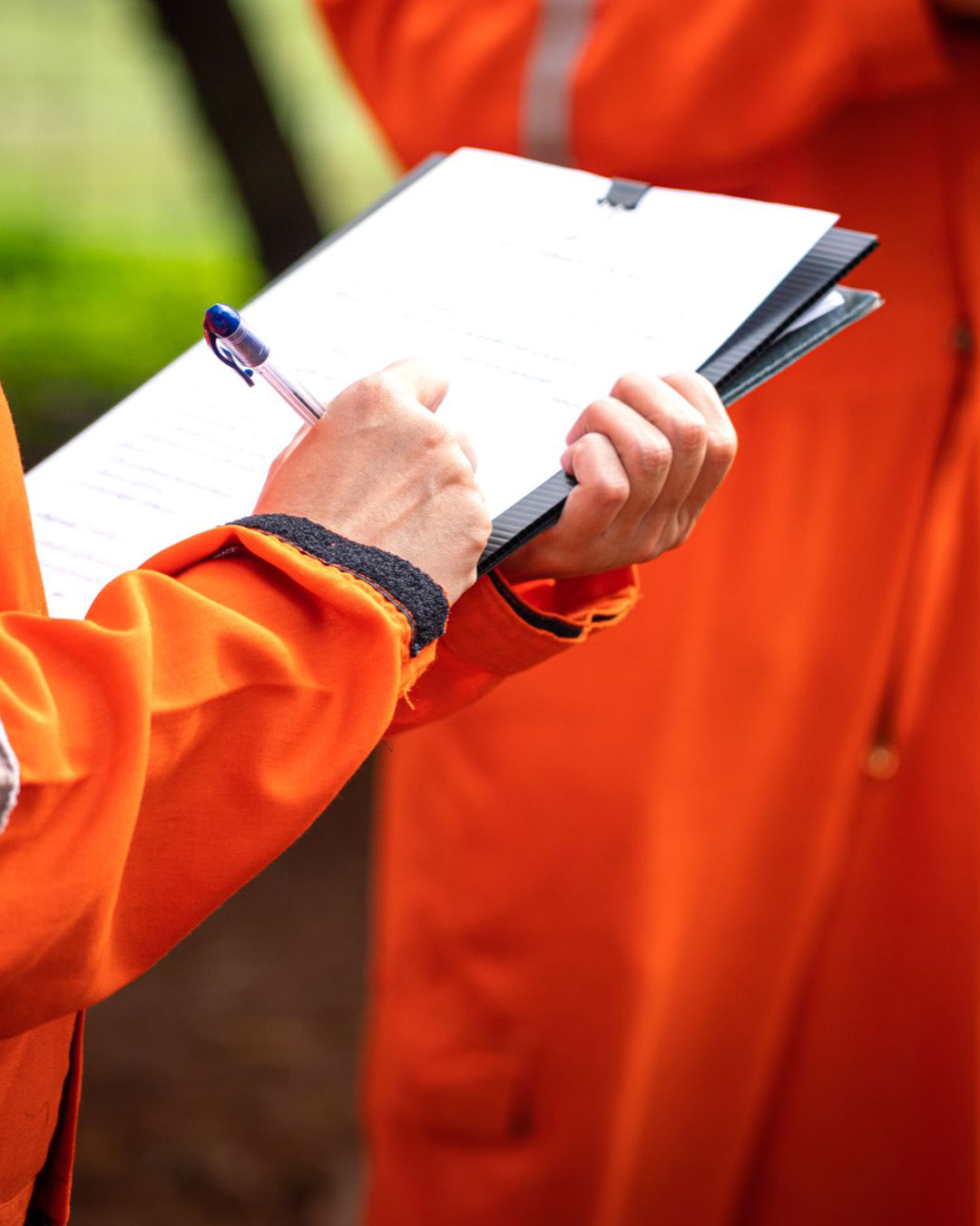 action-safety-officer-is-writing-safety-checklist-document-safety-audit-inspection (002)alt